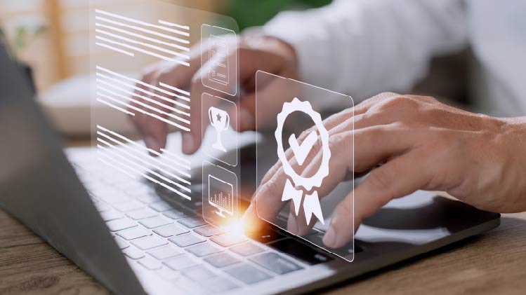 Hand typing on laptop with semi-transprent graphics overlay