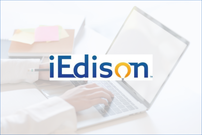 iEdison logo with person typing on computer in background