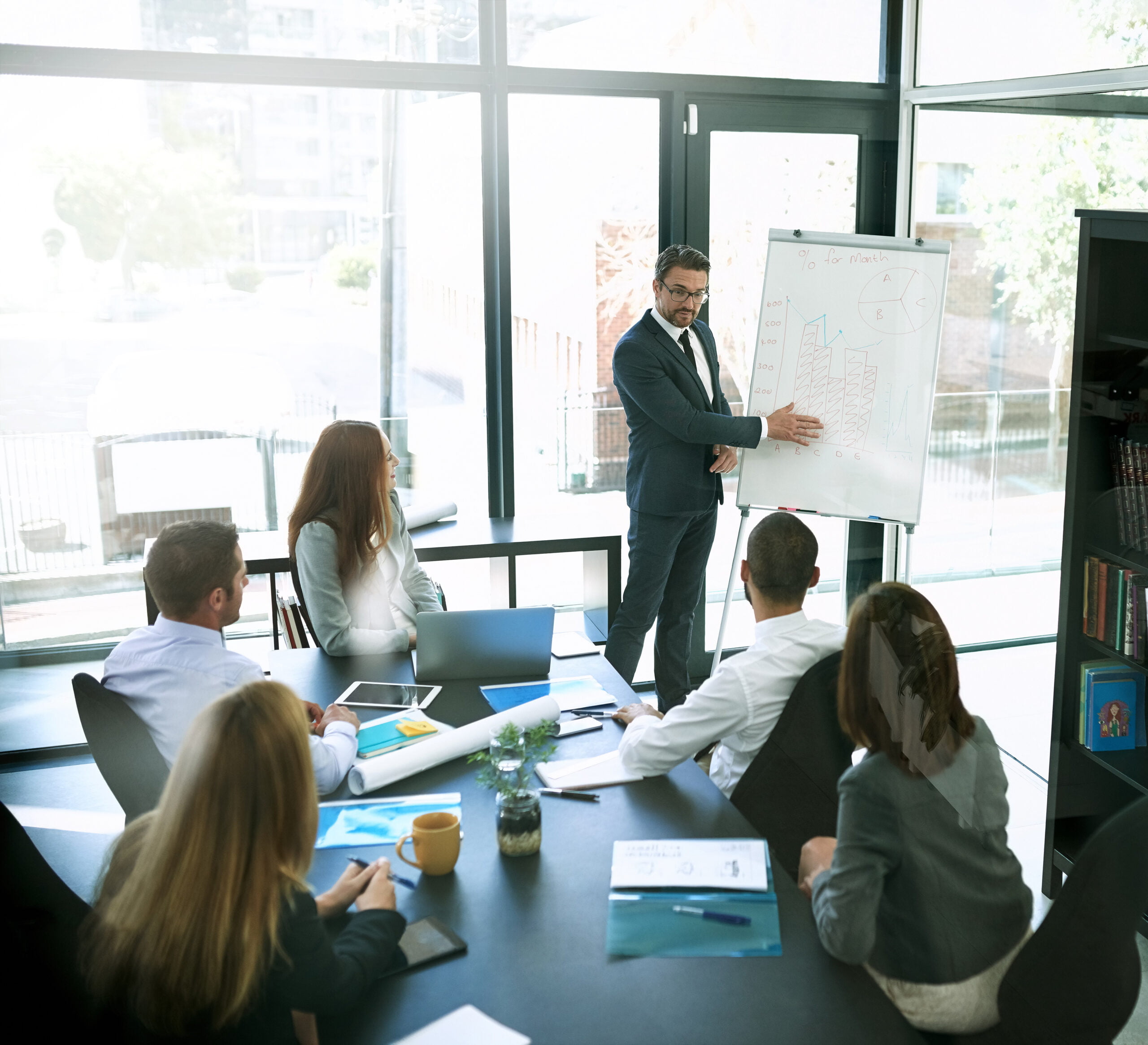 Shot of a businessman giving a presentation to his colleagues in an office.